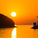 Sonnenuntergang in der Hafeneinfahrt von Vrsar - Istrien